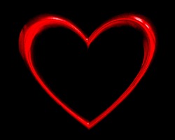 red heart shape over black background