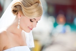 Beautiful bride outdoors - soft focus