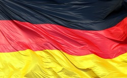 Silky flag of Germany flying in the wind