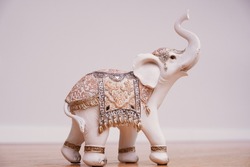 White Indian elephant figurine with mirror and glass ornaments	
