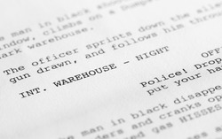 Close-up of a page from a screenplay or script in proper Hollywood format, with generic text written by the photographer to avoid any copyright issues.