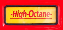 High Octane sign at classic fuel pump on red background