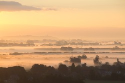 A sunrise above the fog in the Netherlands.
