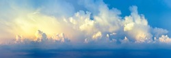 Panorama of Dramatic vibrant color with beautiful cloud of sunrise. Panoramic image
