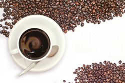 white coffee cup and beans on white background