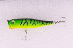 Classic Fishing Lure Wobbler with hooks isolated on white
