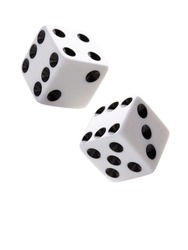 A pair of gambling dices falling down against white background.