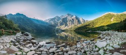 Tatra National Park, Poland. Panorama Famous Mountains Lake Morskie Oko Or Sea Eye Lake In Summer Morning. Five Lakes Valley. Beautiful Scenic View. UNESCO's World Network of Biosphere Reserves