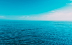 Calm Sea Ocean And Blue Sky Natural Background Backdrop.