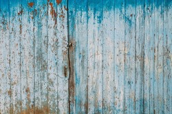 Aged Natural Old Blue Color Obsolete Wooden Board Background. Grungy Vintage Wooden Surface. Painted Obsolete Weathered Texture Of Fence.Aged Natural Old Blue Color Obsolete Wooden Board Background