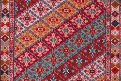 Carpet Texture, Abstract Ornament. Colorful Oriental Mosaic Carpet With Traditional Ornament. Patterned Carpet. Closeup View Of Handmade Woven Carpet.