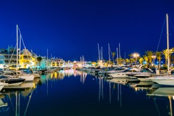 Night Scenery View Of Embankment, vessel In Benalmadena. Benalmadena is a town in Andalusia in Spain, 12 km west of Malaga, on the Costa del Sol. It caters for a large number of tourists.