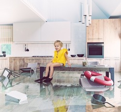 
Boy playing On Table While Flooding in the kitchen. Media and photo combination creative concept 