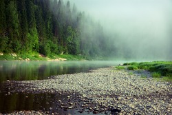 beautiful fog on a river photo