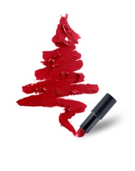 Christmas tree of red lipstick smeared. Beauty cosmetic creative concept