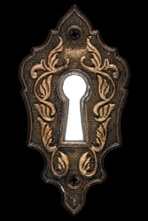 Bright light in the keyhole, decorative design element, isolated on black background