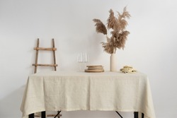 Elegant tablecloth in Ecru color, selective focus image