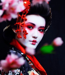young pretty geisha in kimono