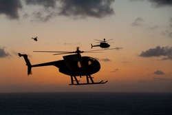 Helicopter over gorgeous Hawaii sunset horizon
