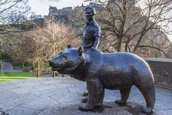 Edinburgh, Scotland - January 17, 2020: Voytek the Soldier Bear sculpture in Princes Street Gardens, Edinburgh city