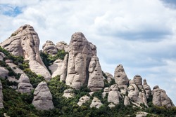 Conglomerate rocks in Montserrat mountains near Maria de Montserrat Abbey, Spain