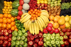 Big assortment of fresh organic fruits. Frame composition of fruits on market stall