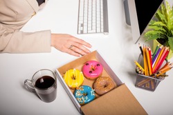 Working space with coffee and donuts 