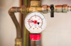 Pressure gauge on a sealed central heating system in a UK home