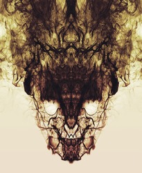 Psychedelic smoke reflections form a creepy symmetrical skull face. A dark, burning, smokey, freaky demon.