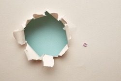 Hole in the paper. Abstract background