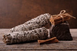 Dried white sage smudge sticks for relaxation and aromatherapy. Essential incense for esoteric rituals .Organic burning sage smudge.