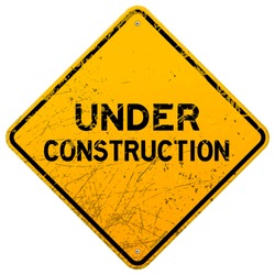 Dirty Under Construction Sign