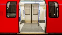 Inside view of London Underground, Tube Station, train stopped opening the door