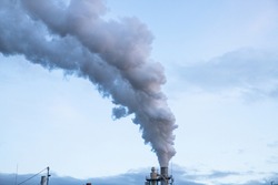 smoke coming out of factory chimney industry and global warming