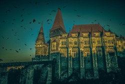 haunted castle at night in Transylvania Halloween background