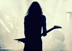 Guitarist silhouette- retro style photo