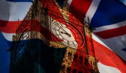 union jack flag and iconic Big Ben at the palace of Westminster, London - the UK prepares for new elections
