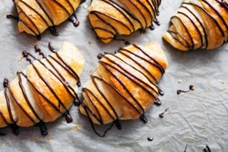 Fresh homemade croissants with chocolate