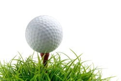 Golf ball on green grass, selective focus