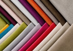 Bright collection of colorful velour textile samples. Fabric texture background