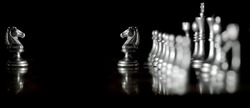 Pieces on chess board for playing game and strategy knight kingdom gaming face off battle