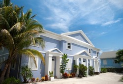 The little residential building on a main street in George Town on Grand Cayman island (Cayman Islands).