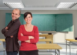 A pair of smiling teachers in a classroom