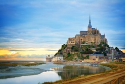 Mont St Michel city at sunset, Brittany France, toned