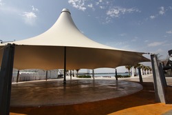 huge white tent as an umbrella