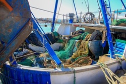 nets, pulley ropes and machinery of a fishing boat
