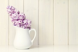 flower in white vase greeting card background