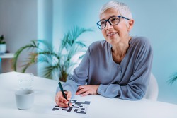 Crosswords. Cognitive rehabilitation therapy for senior women.