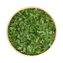 chopped leaves of fresh herbs, parsley, dill, cilantro, basil, in dereyannoy bowl isolated white background