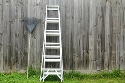 Aluminum ladder against the wall.